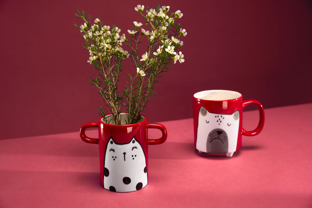 Hand painted red mug with dog illustration