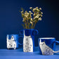 Handmade blue vase with cat illustration