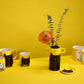 Handmade yellow vase with a black cat illustration